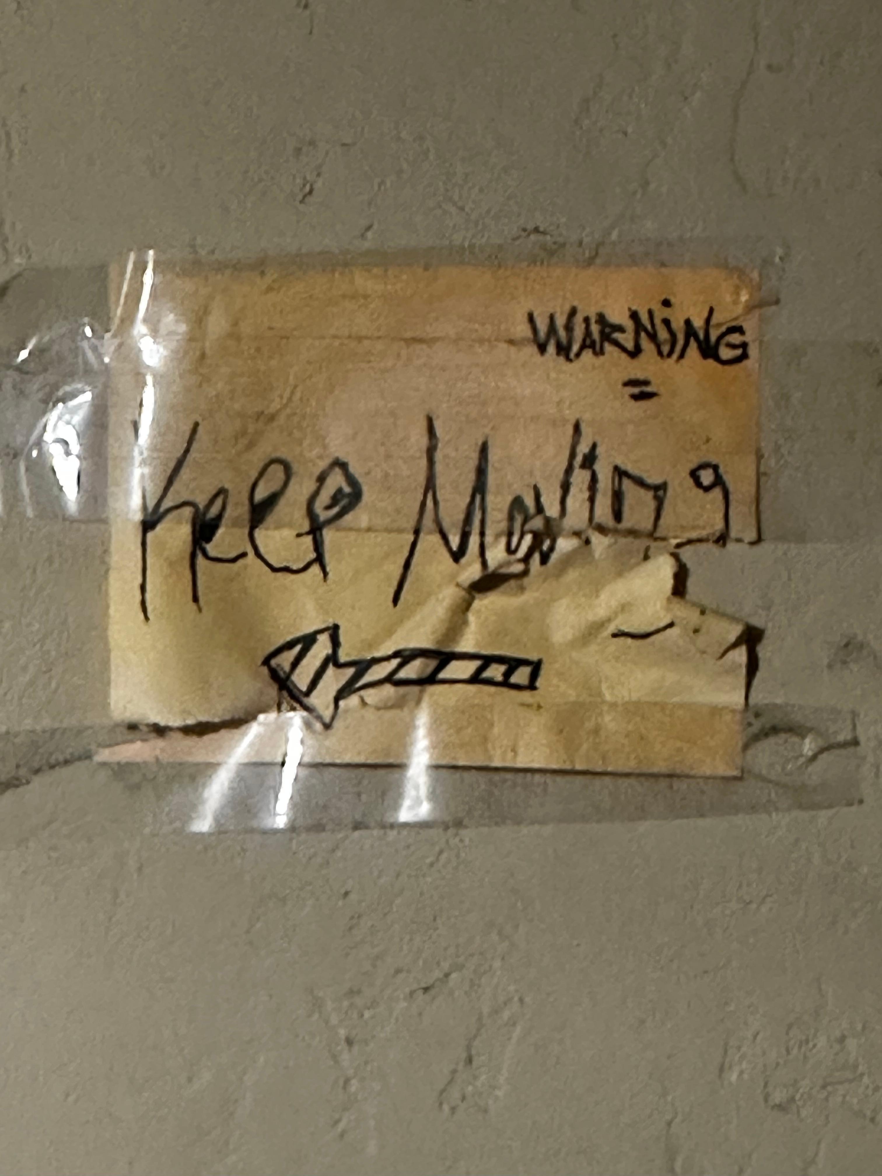 The sign hanging when you walked up the the second floor 