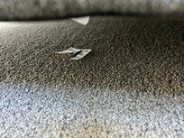 Open Condom packet under the bed