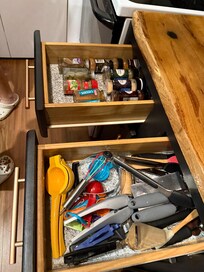 Plenty of seasonings and cooking tools.