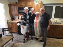 Our small family in the house kitchen.