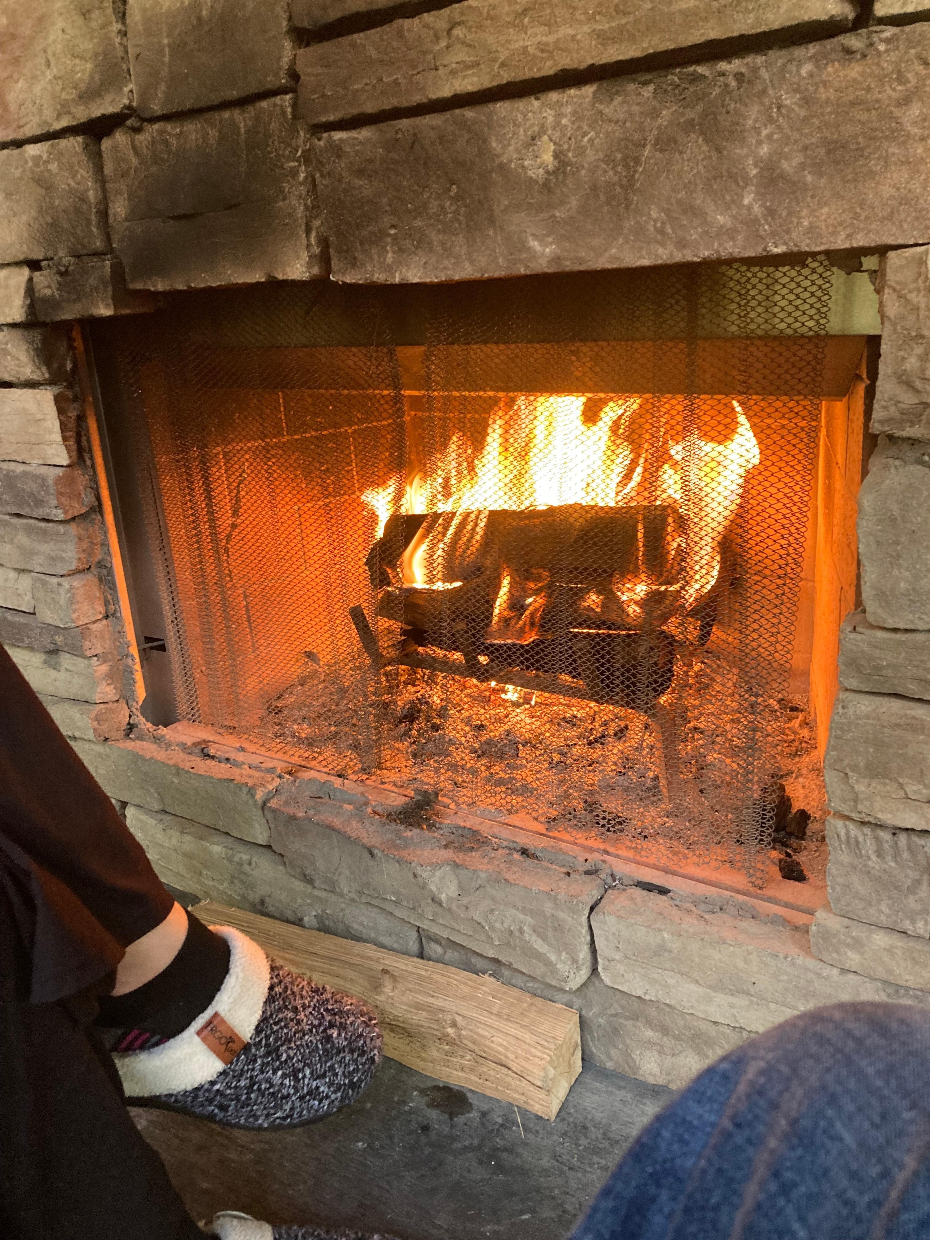 Porch fireplace near stream 