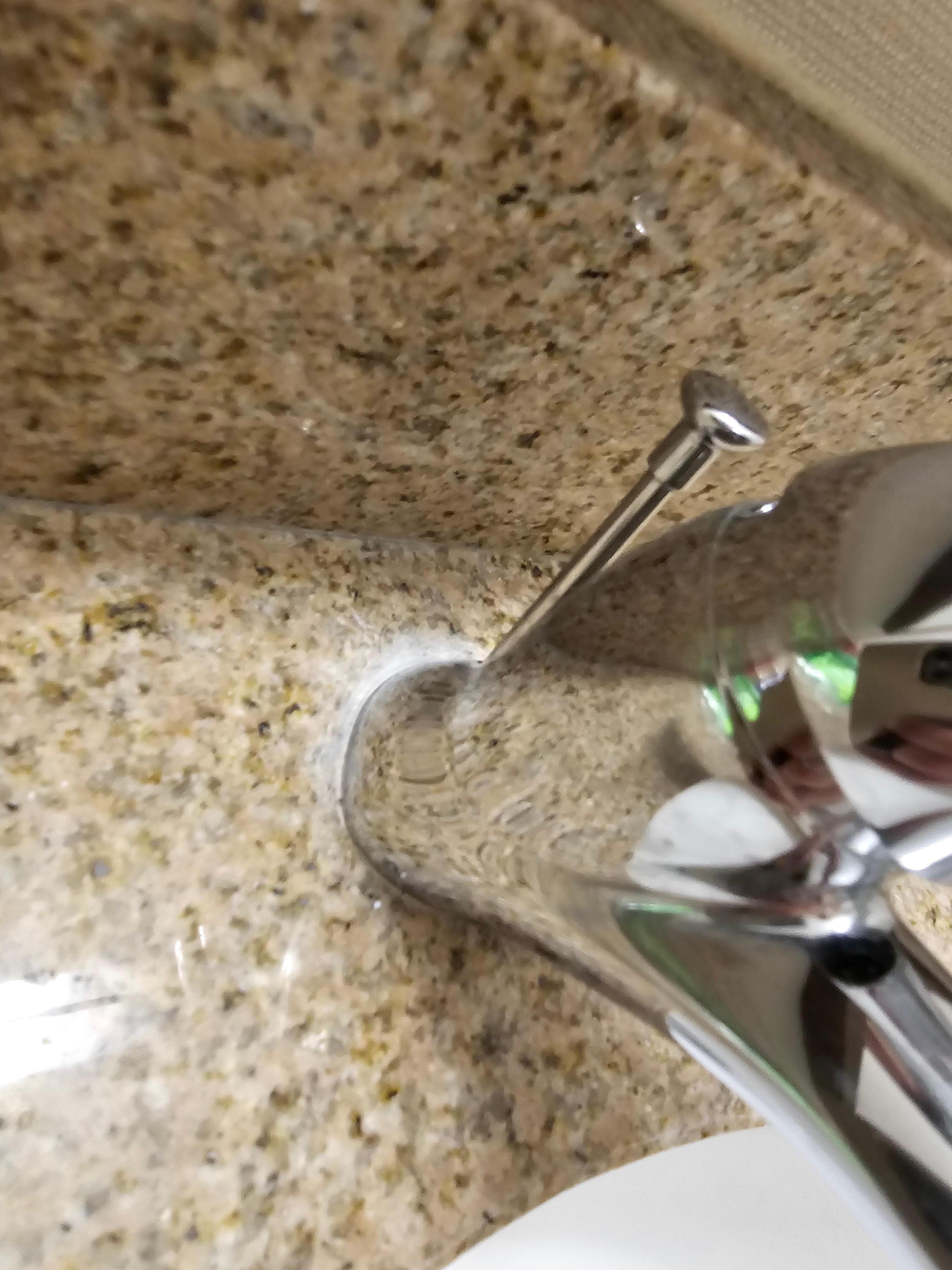 Behind sink