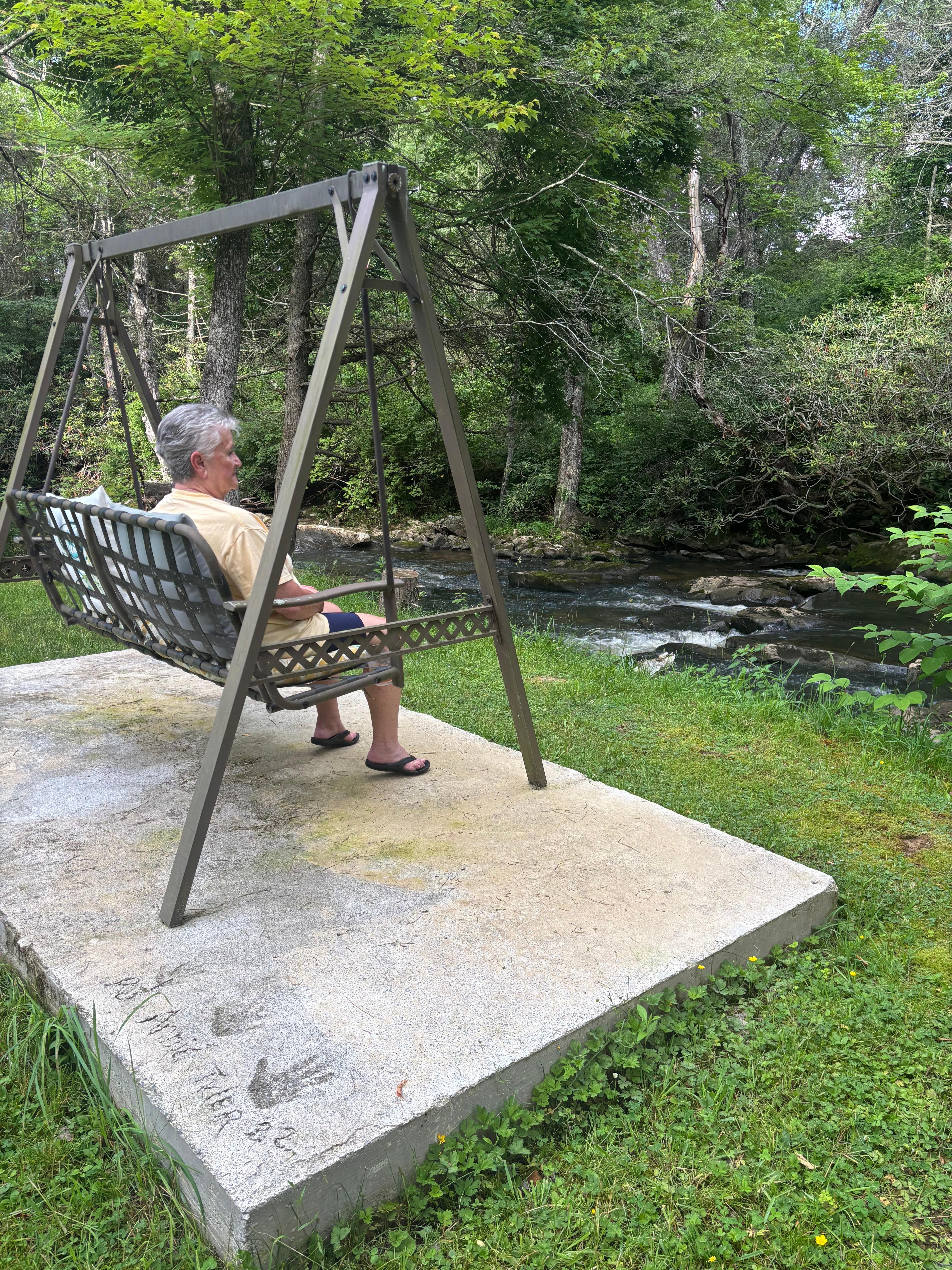 Swing by ground hog burrow and creek.