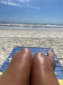 At the beach in front of the unit.
