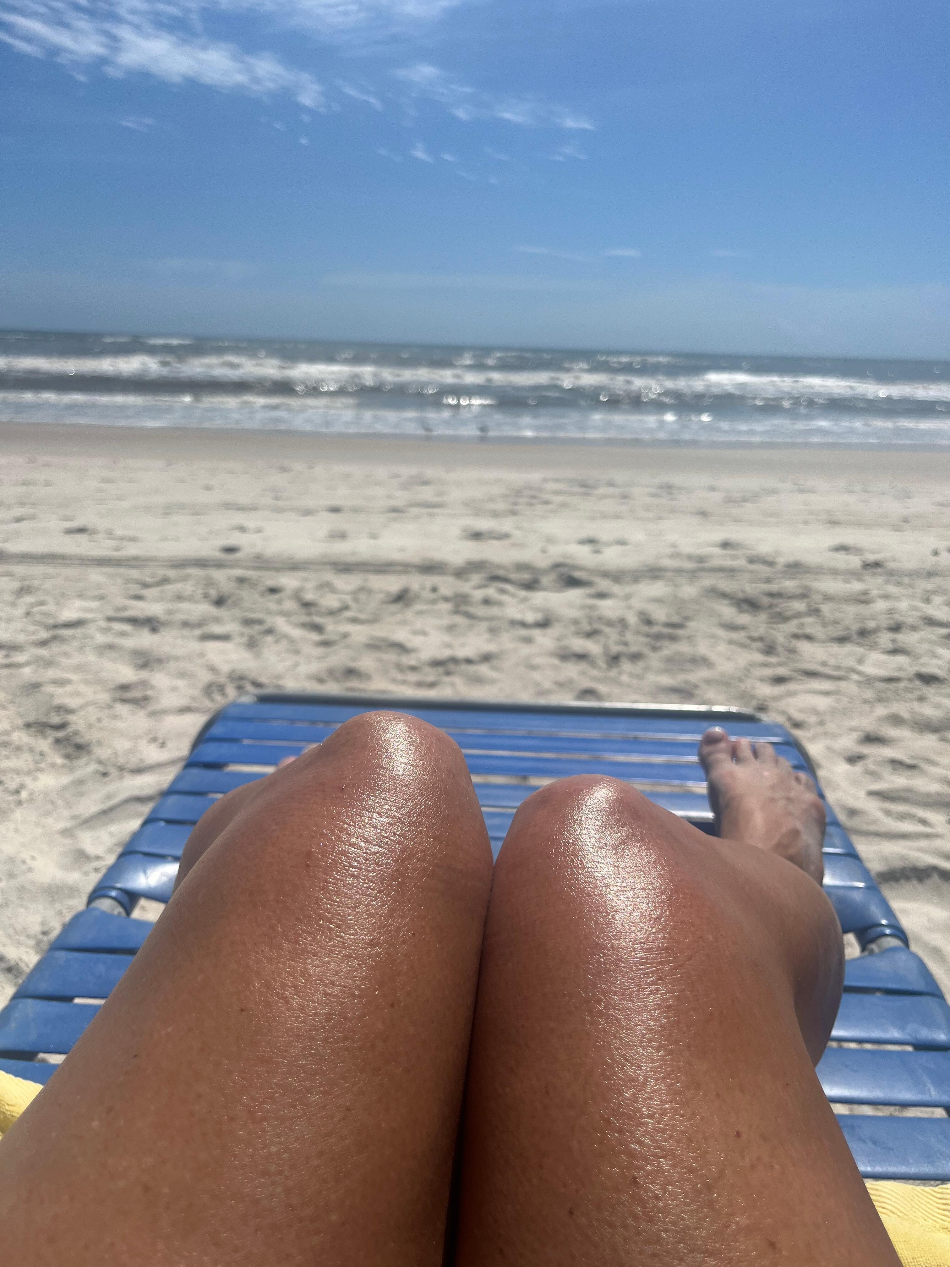 At the beach in front of the unit.