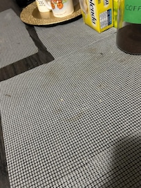 dirty 'kitchen' counter, food crumbs and other stuff