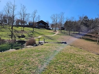 Picture taken from down by the pond looking up at the back of the Lodge.