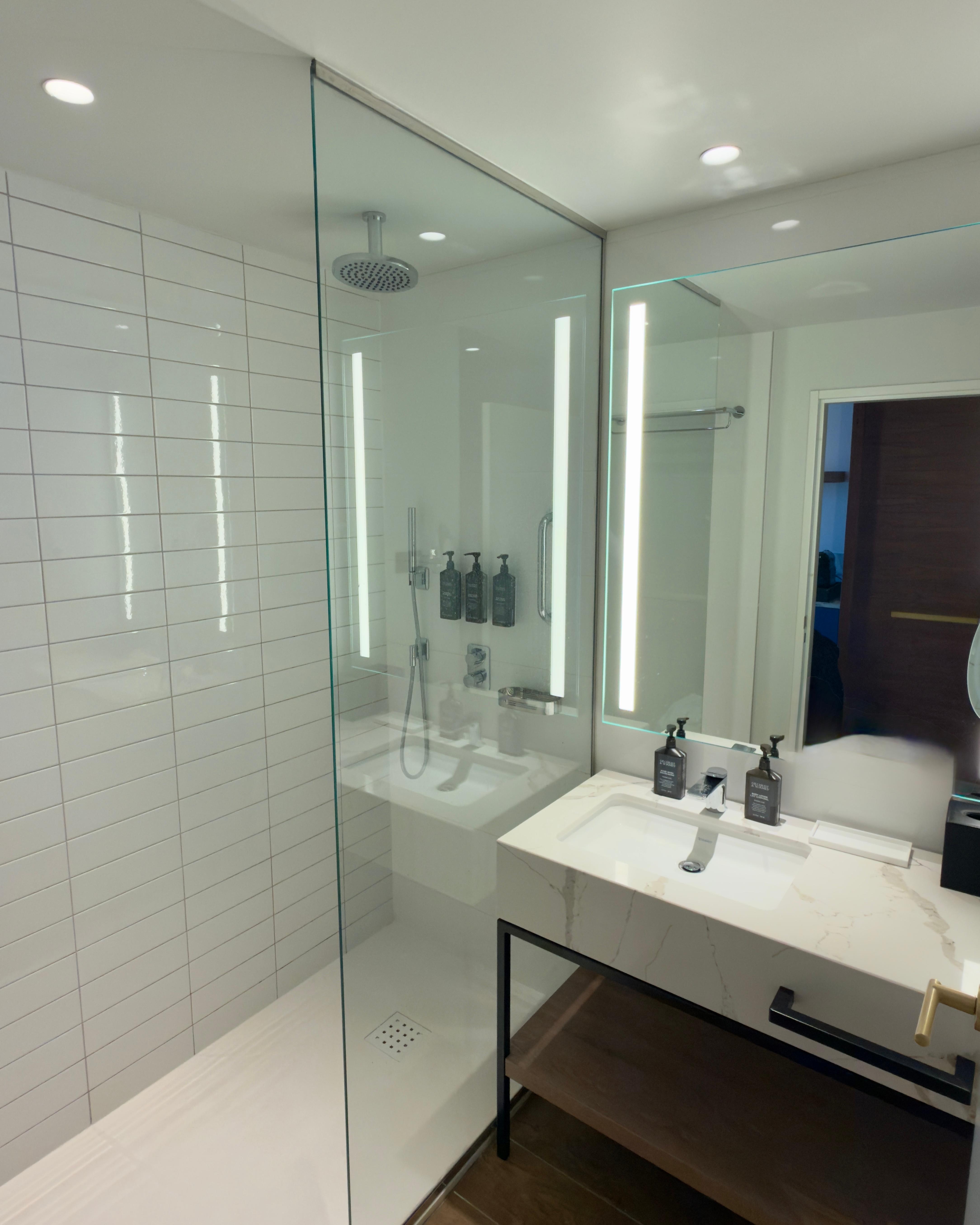 The bathroom with a generously sized shower.