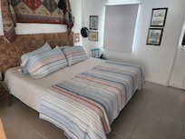 Very comfy bed and easy access to back patio with chairs