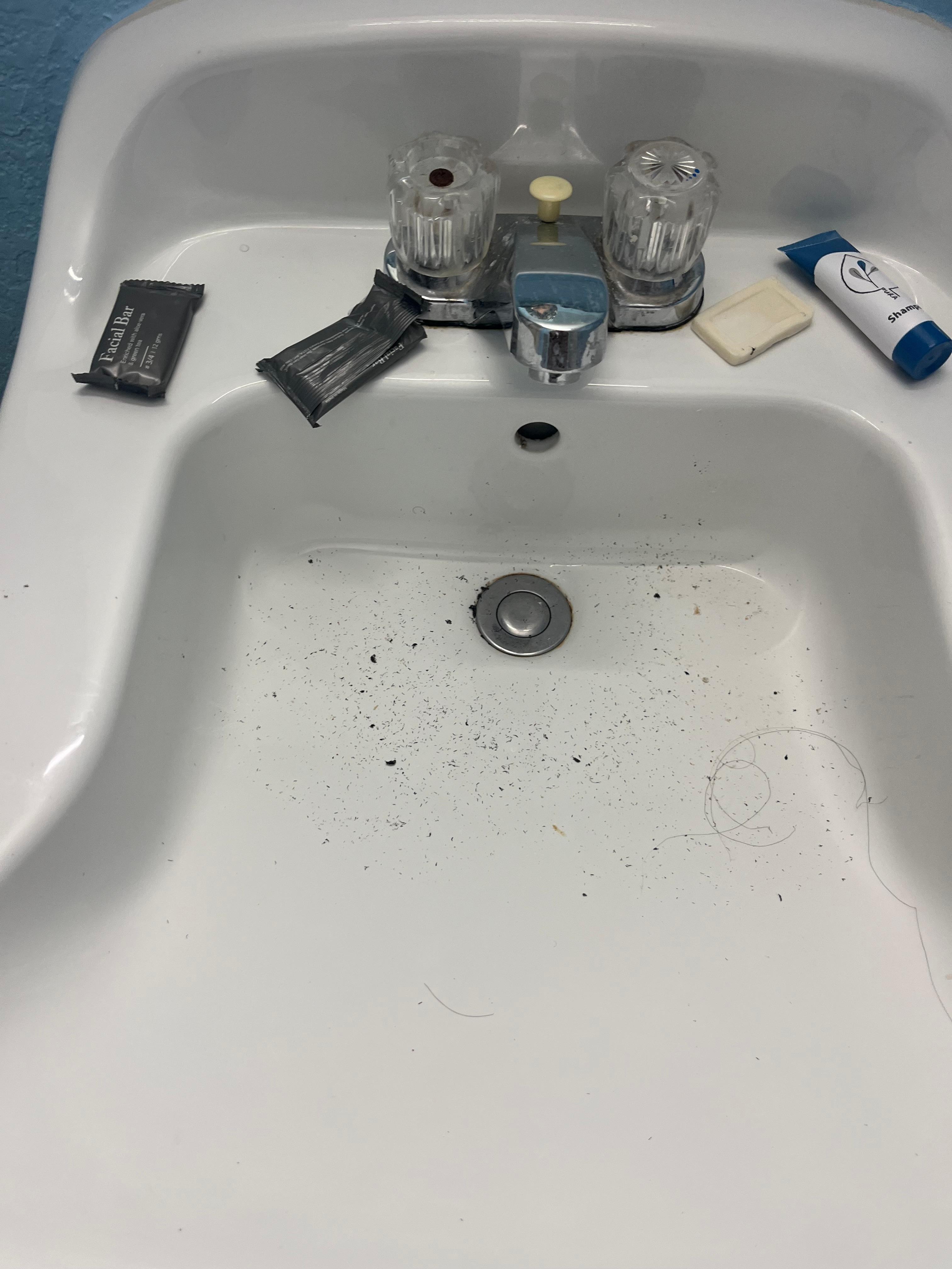 dirty sink the stopper was too hard to pull up plus the sink was leaking 