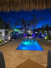 Back of the villa with swimming pool, Nice seating in pool to watch sunsets as well