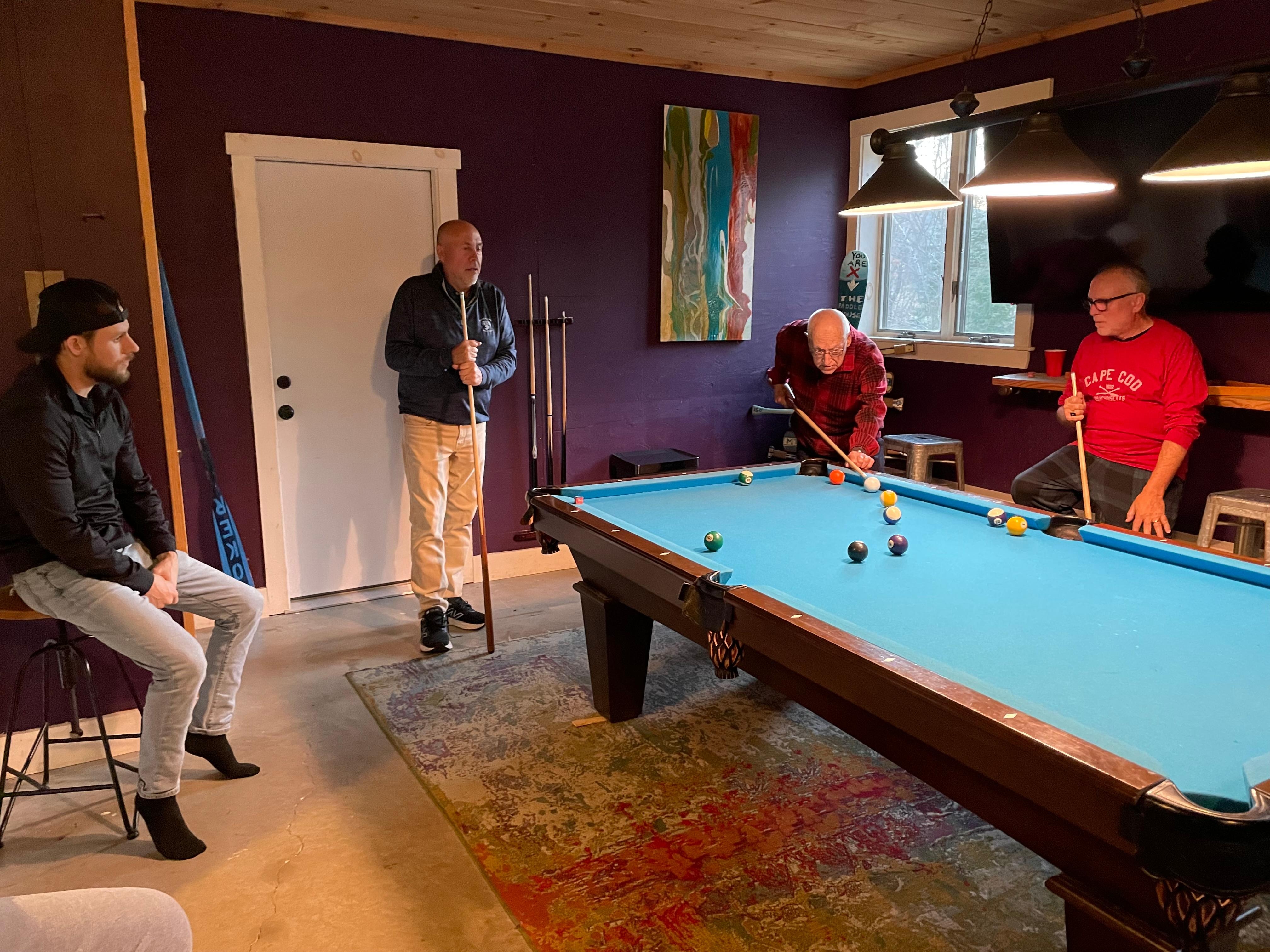 Friendly game of pool with 90 yr old Patriach. 