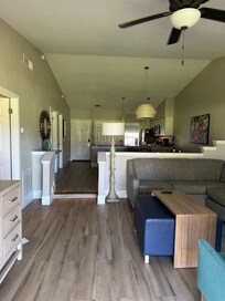 Living room and kitchen in the back
