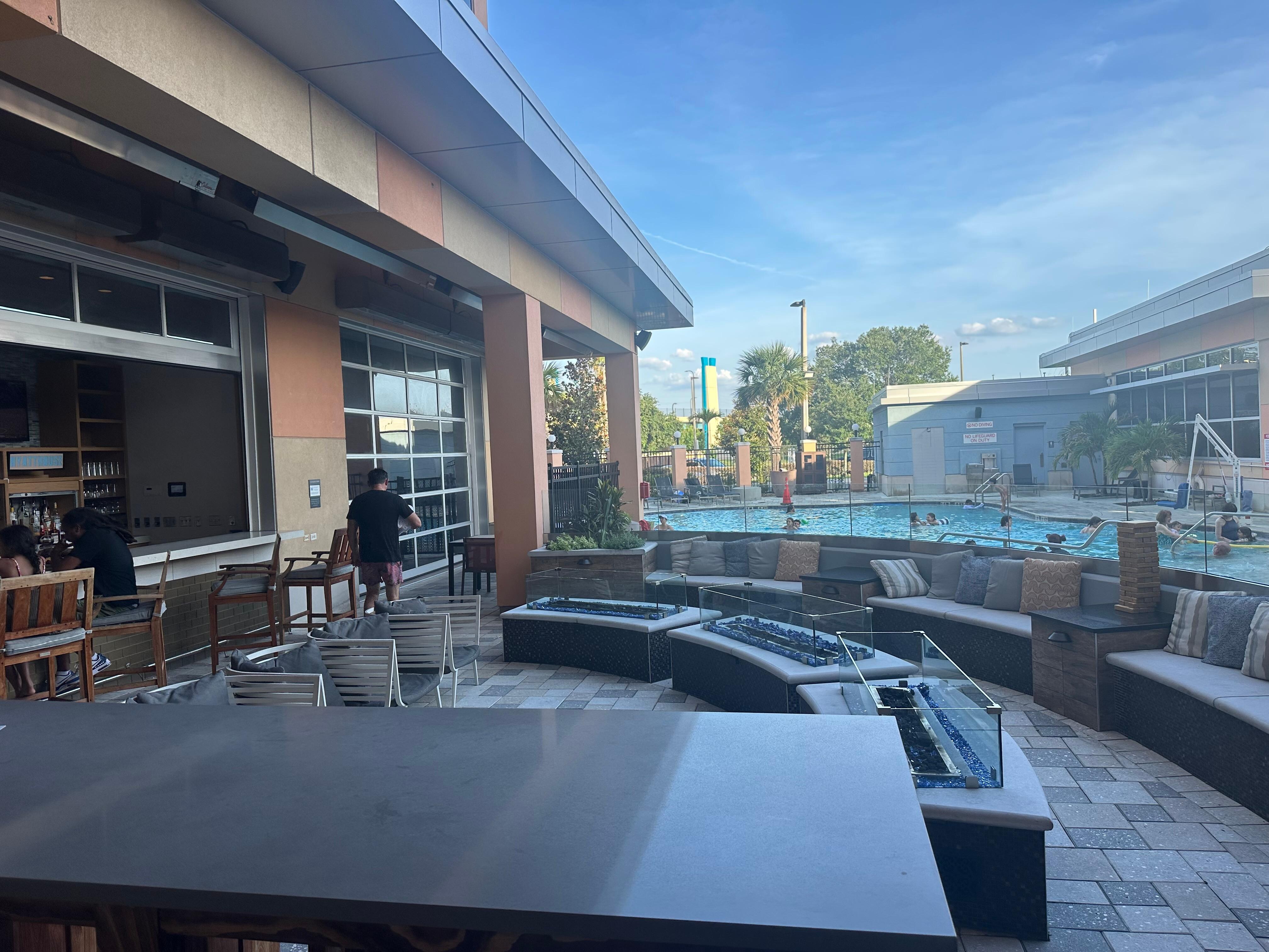Fire pit near bar by pool