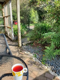 Cute cozy porch for enjoying tea!
