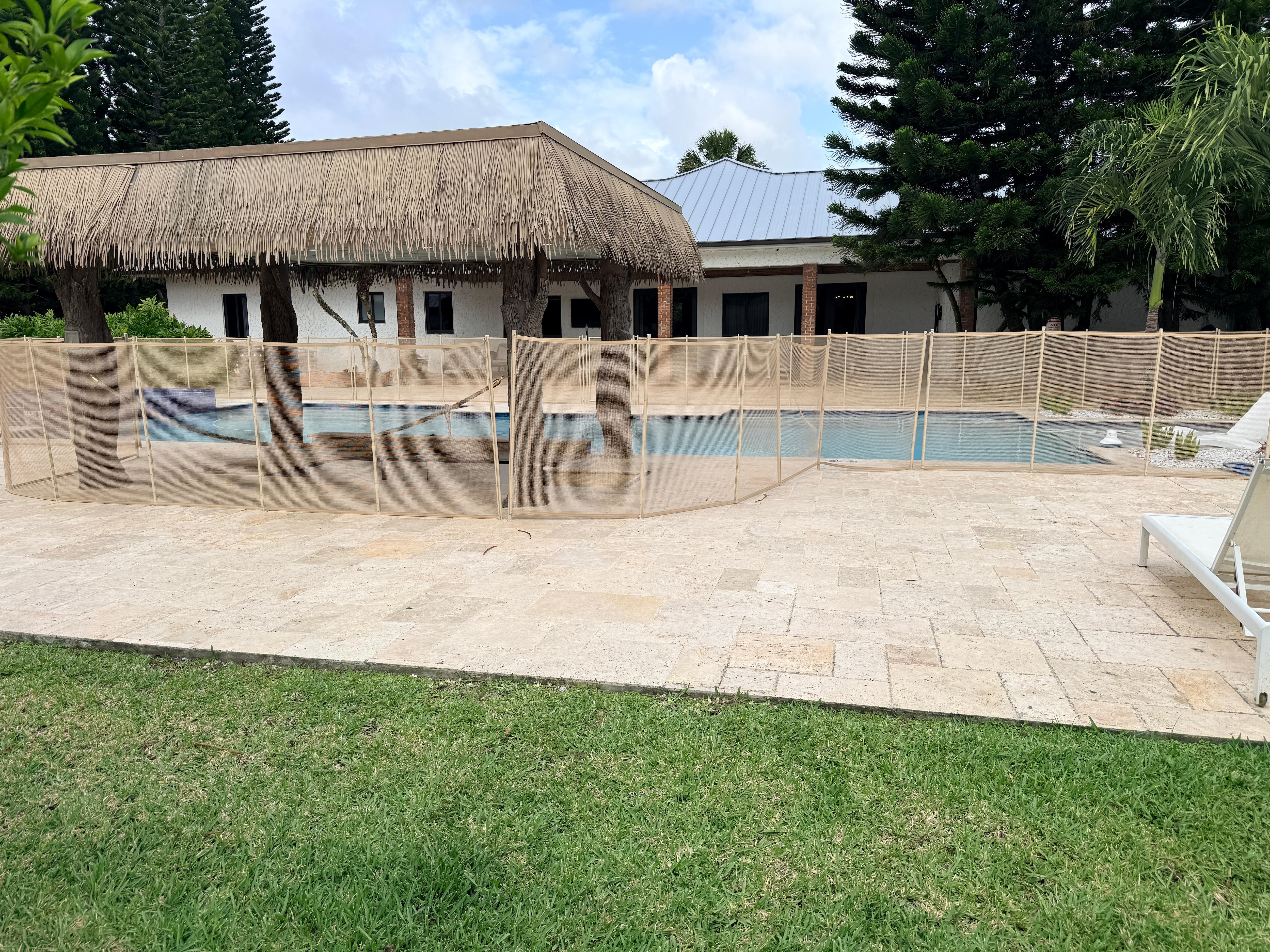 Safety net around pool not shown in photos