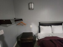 Liked the racks but the room only had 2 hangers. And the bed didn't have the warm blanket I find in other motels.