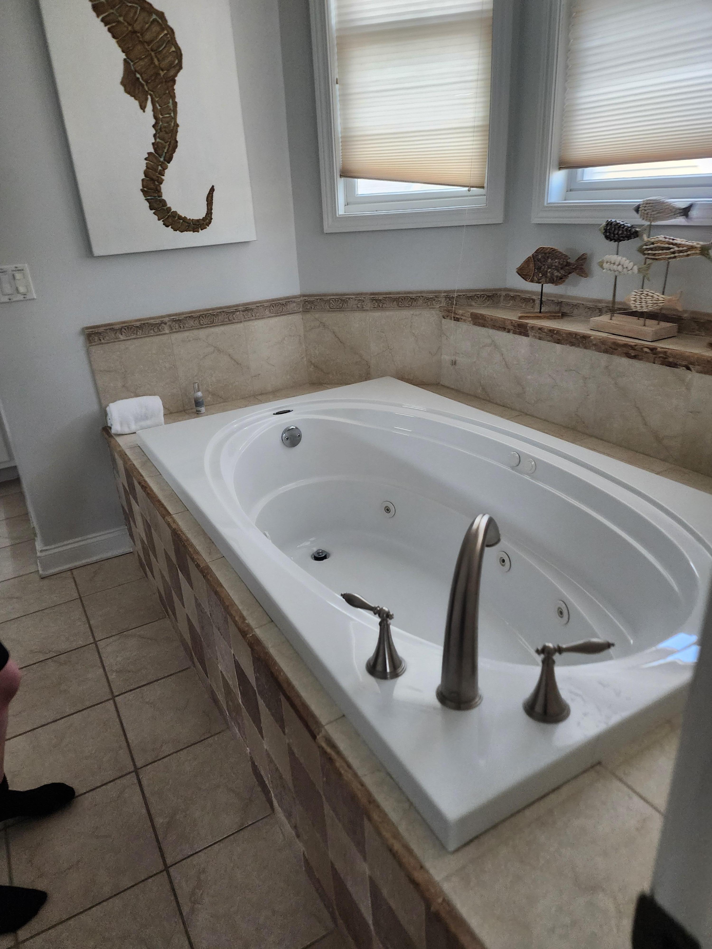 I noticed we NEVER ran out of hot water! Filled the tub up completely! Even while others were showering!