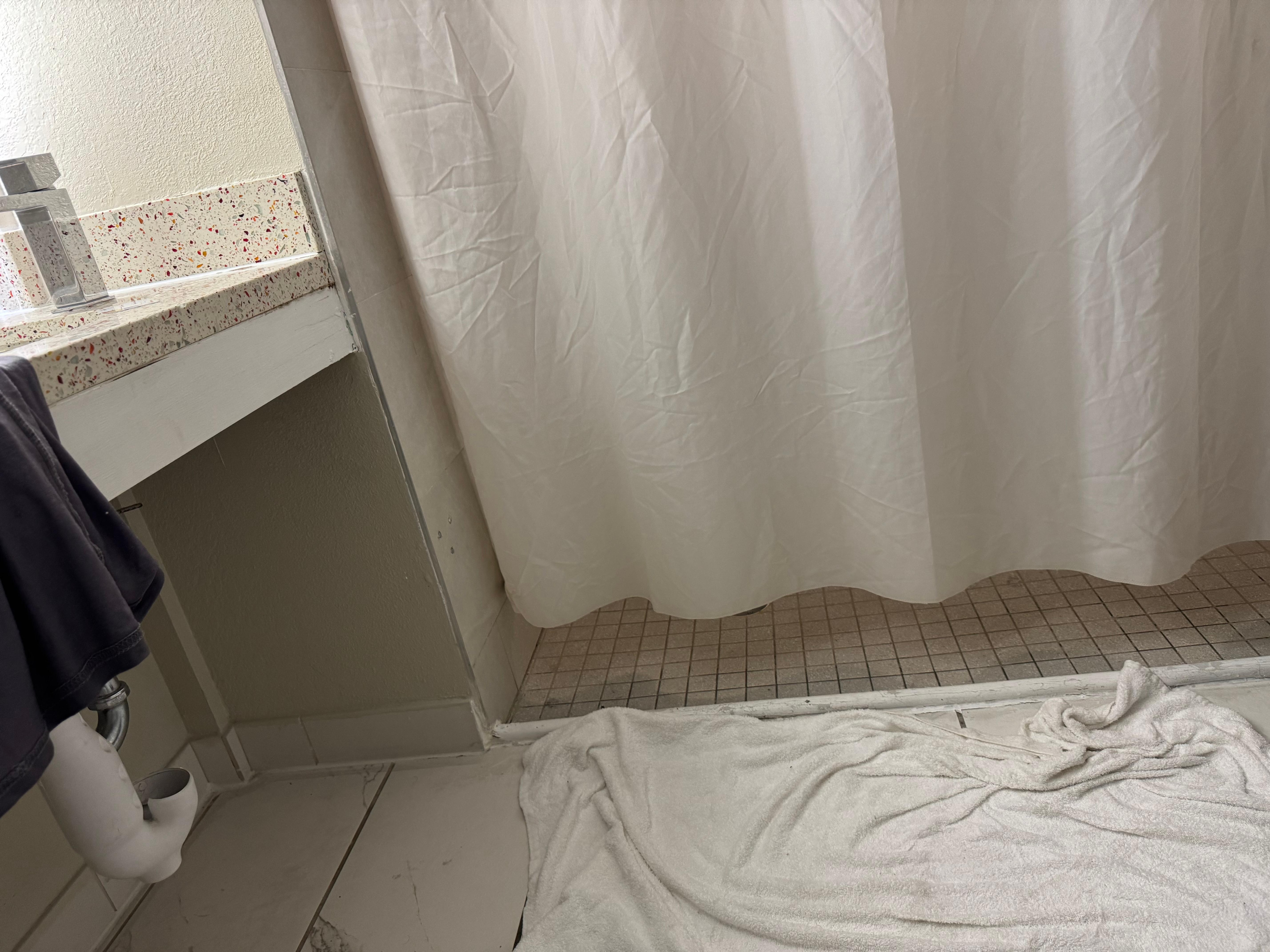 Curtain too short shower water all over floor