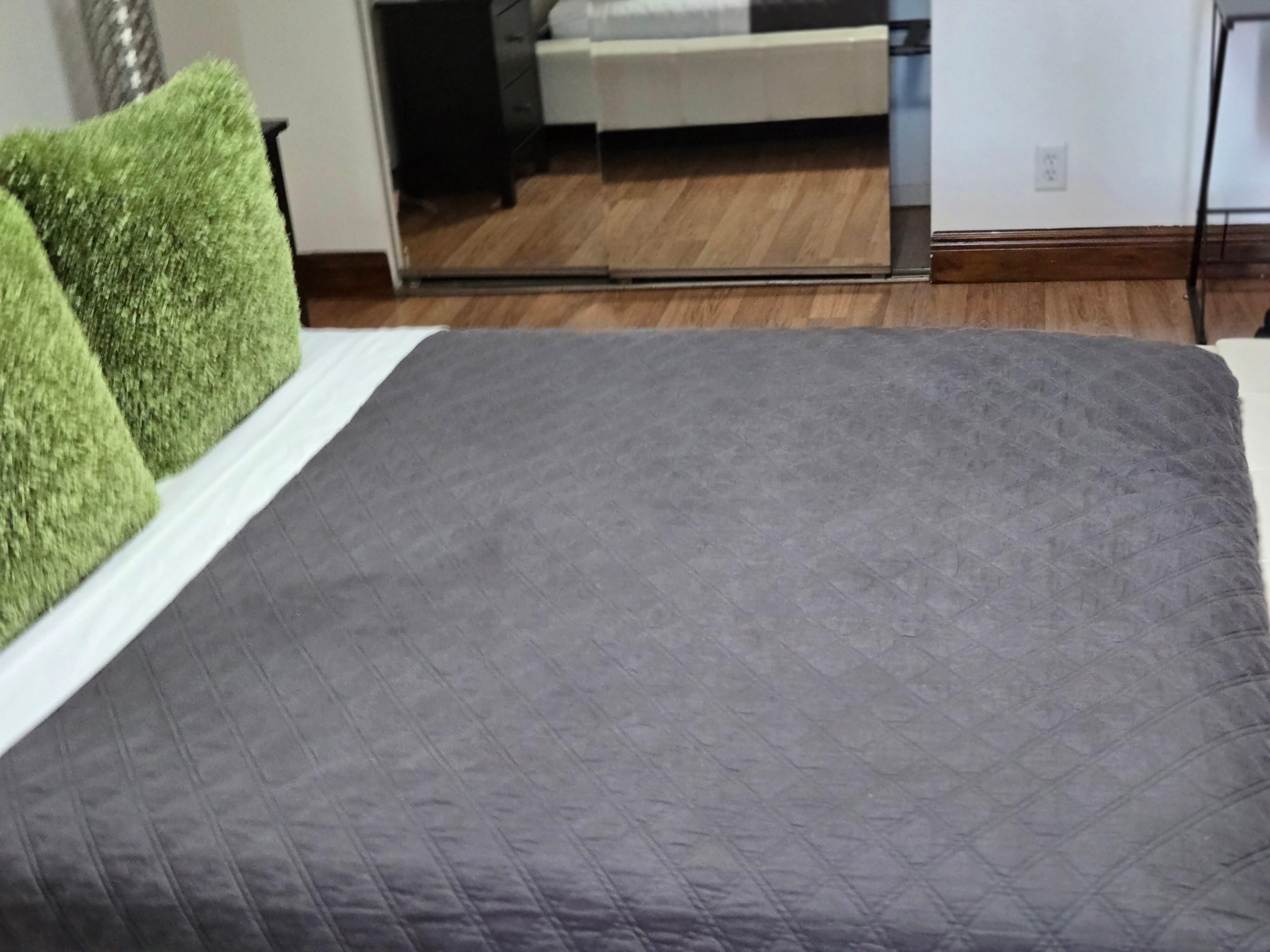 Bed, appears worn out in person