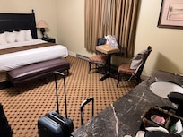 Sink in front of bed