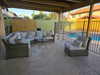 This patio gets the best breeze ALL DAY!! Parent's loved sitting here to watch the kids in the water.