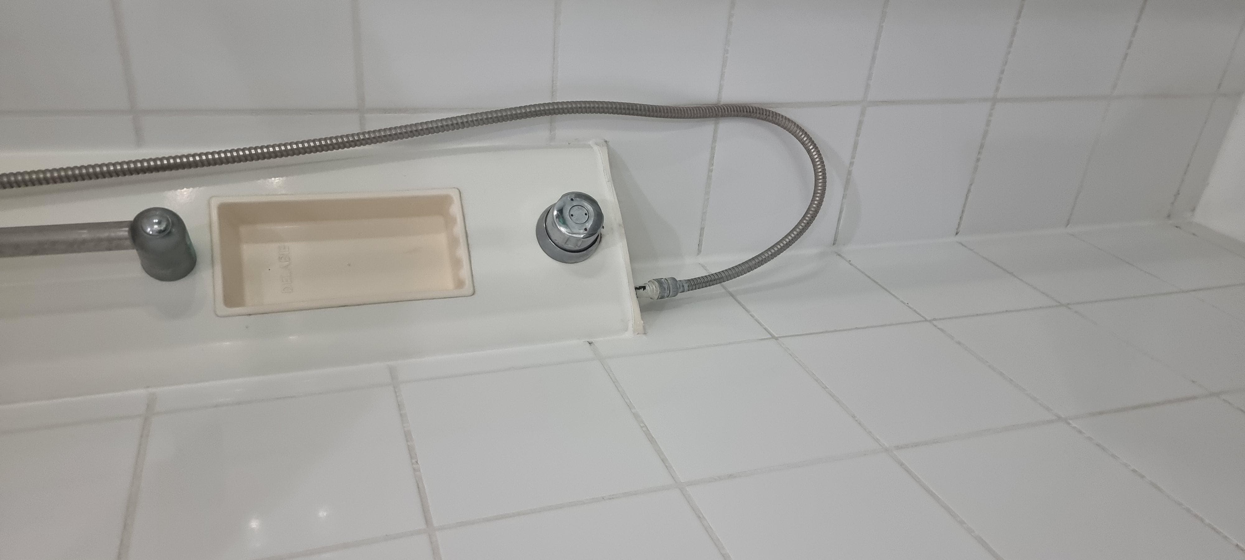 Push button shower
