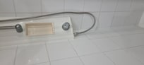 Push button shower