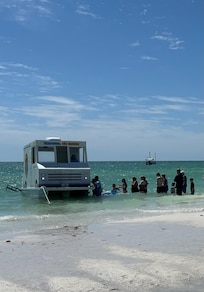 Ice cream boat on the beach