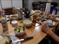 Enjoying a nice dinner, grilled steaks with all the fixings (gas grill on back patio)