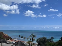 The most magnificent view from the balcony looking over the town and right at the ocean with the stunning cliffs off to the left!