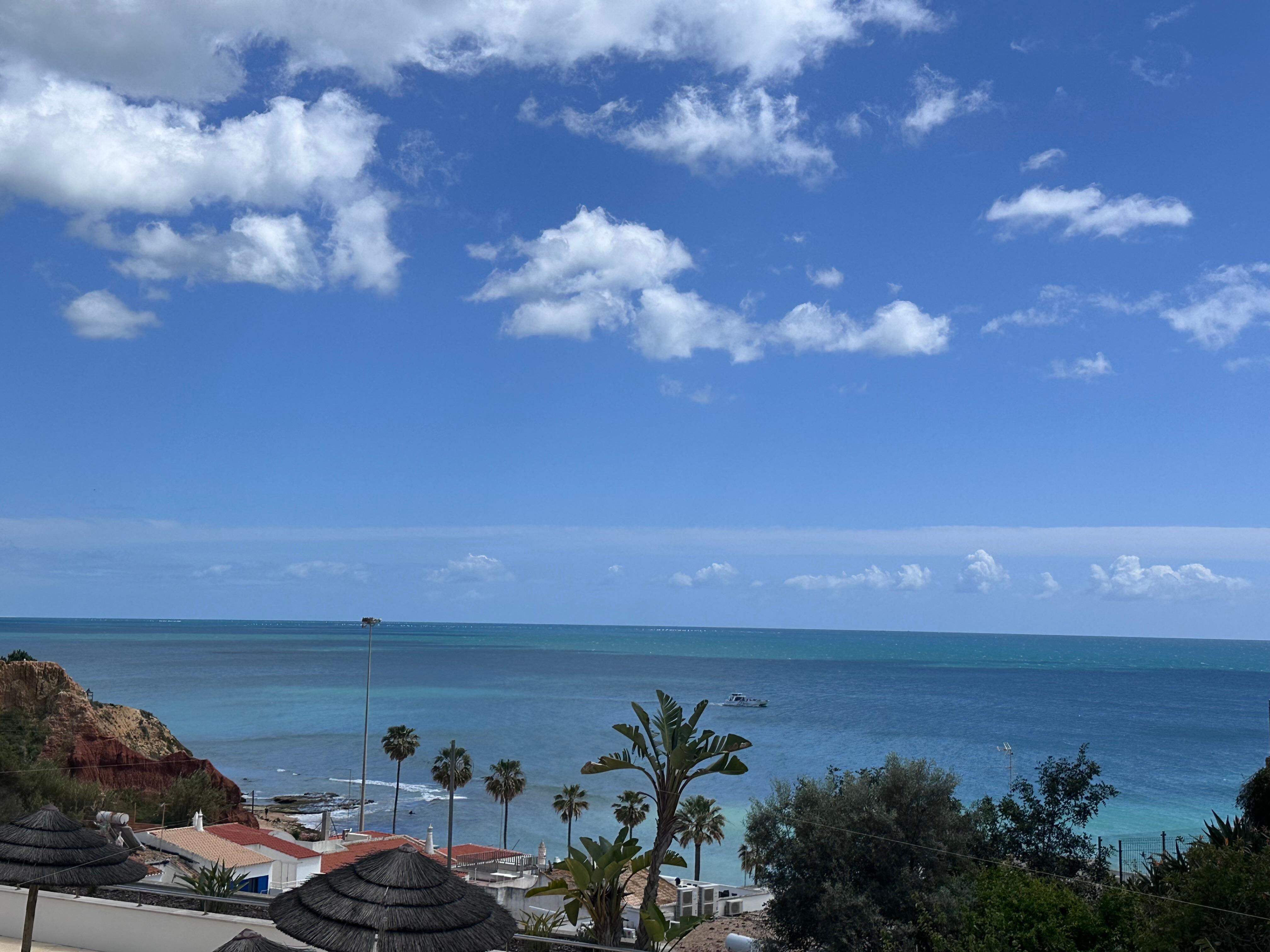 The most magnificent view from the balcony looking over the town and right at the ocean with the stunning cliffs off to the left! 