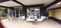 Relaxing outside reception area