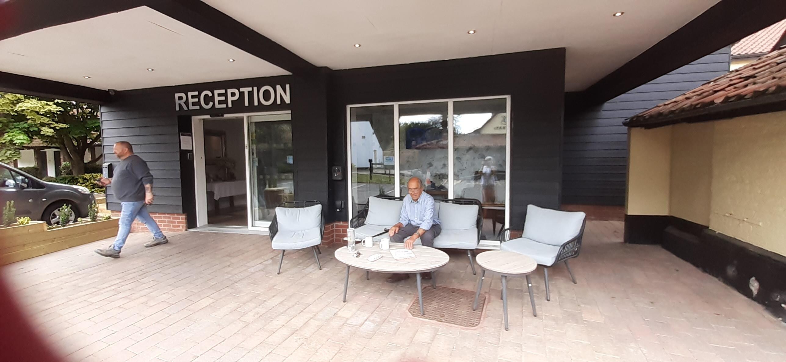 Relaxing outside reception area