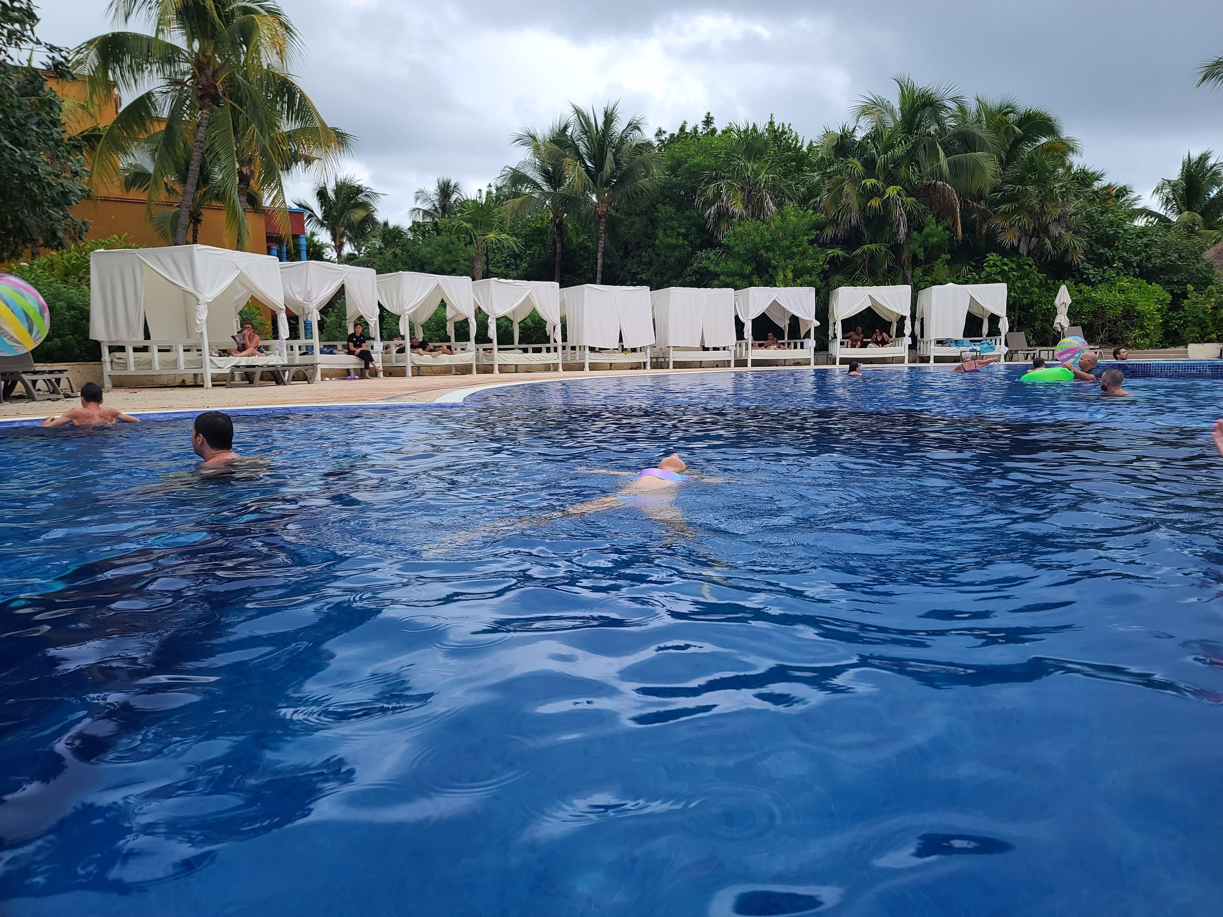 One big pool with shallow, comfortable medium, and deep parts. Pool bar is awesome. Best mudslide cocktail. 