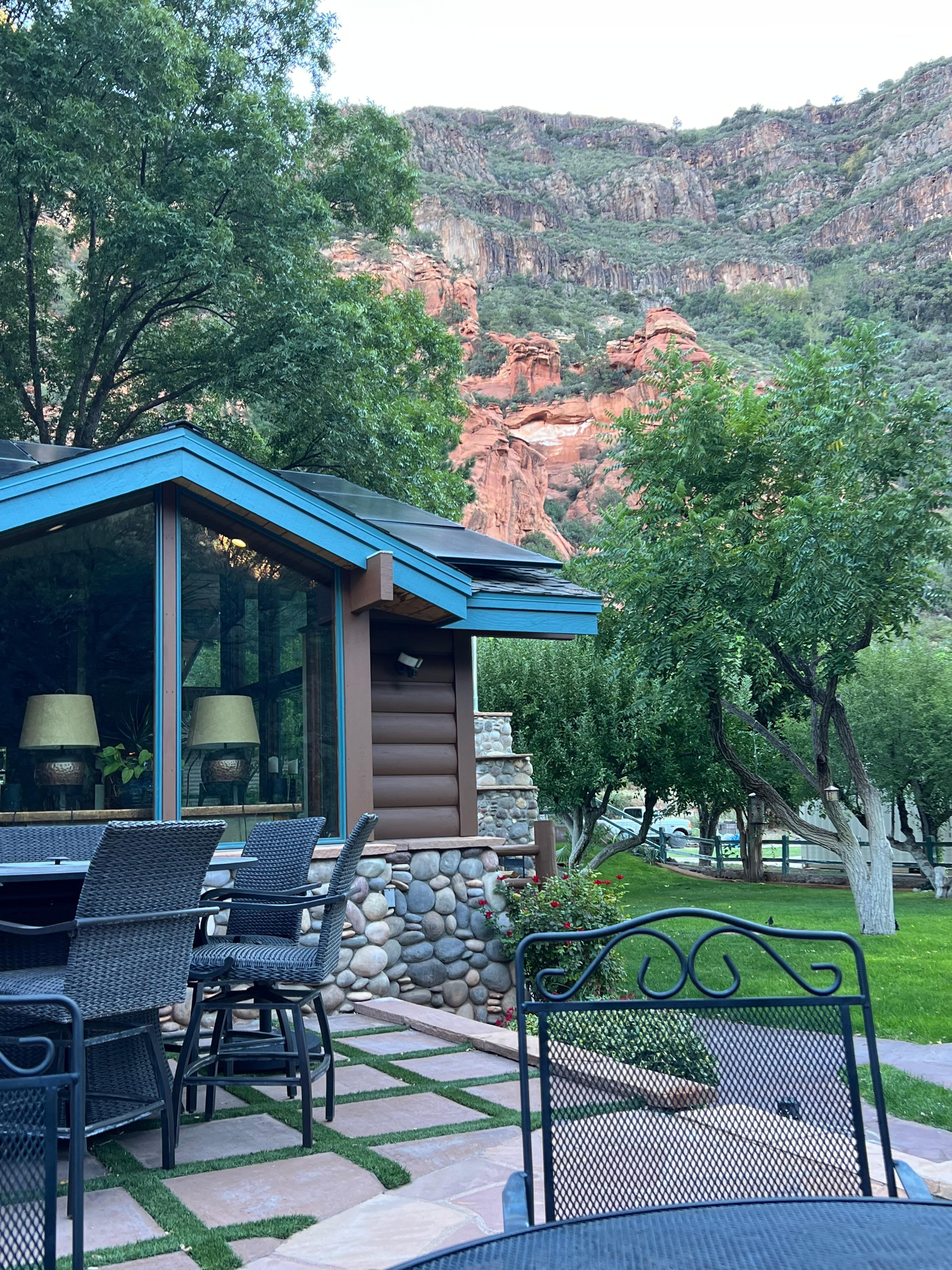 Beautiful view of house with Red Rock in the background.
