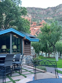Beautiful view of house with Red Rock in the background.