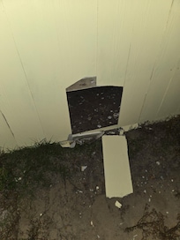 Hole in exterior back fence