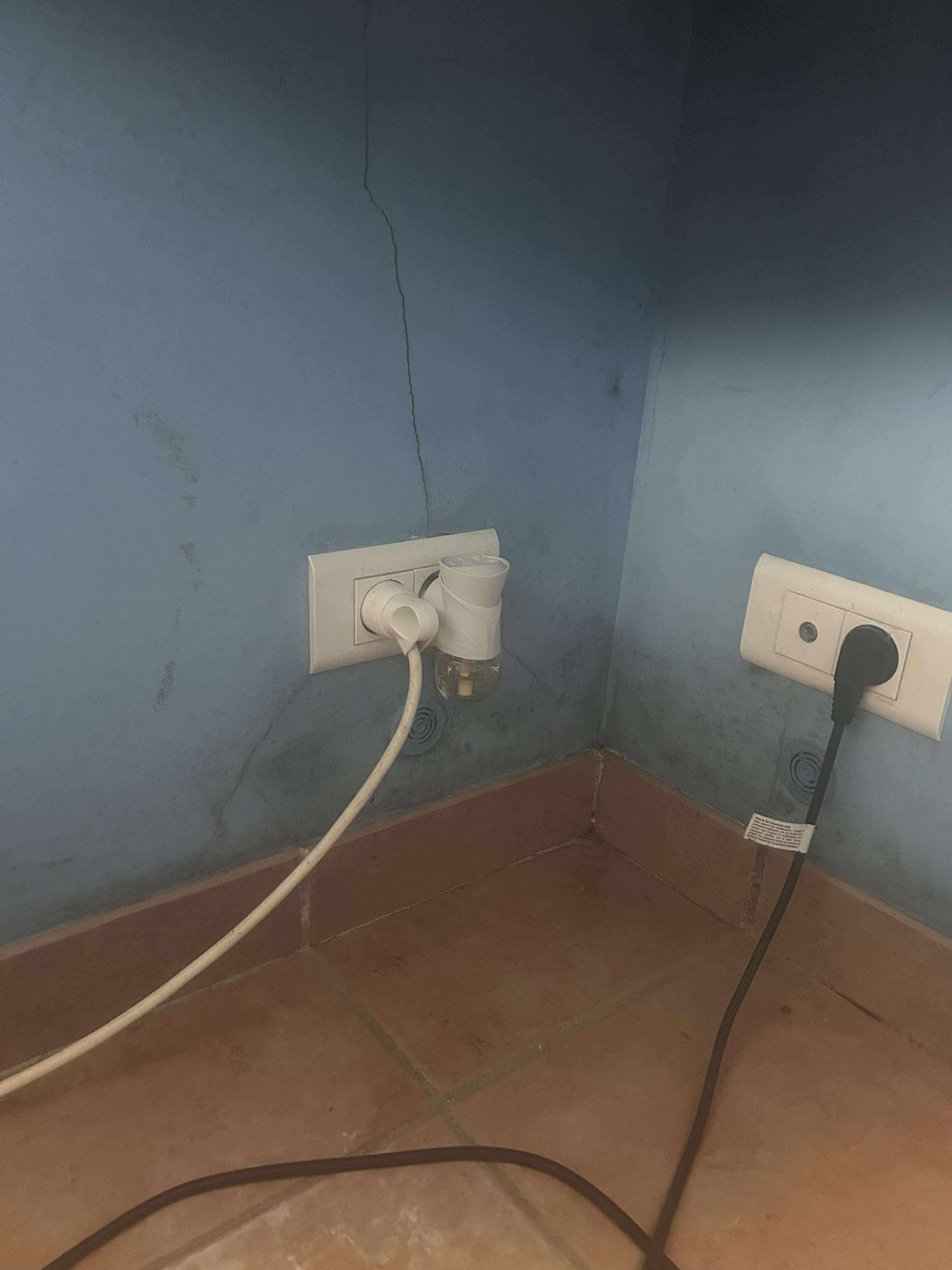 More stains with cracks in walls
