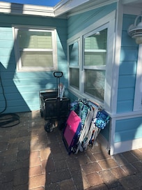 Beach wagon, chairs and umbrella to use.