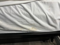 Stains on bed sheets