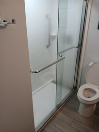 HOW DO YOU OPEN THE DOOR ONCE IN THE SHOWER?