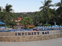View of the entrance to the resort from the beach. It's awesome to float in the pool while looking out at the ocean.