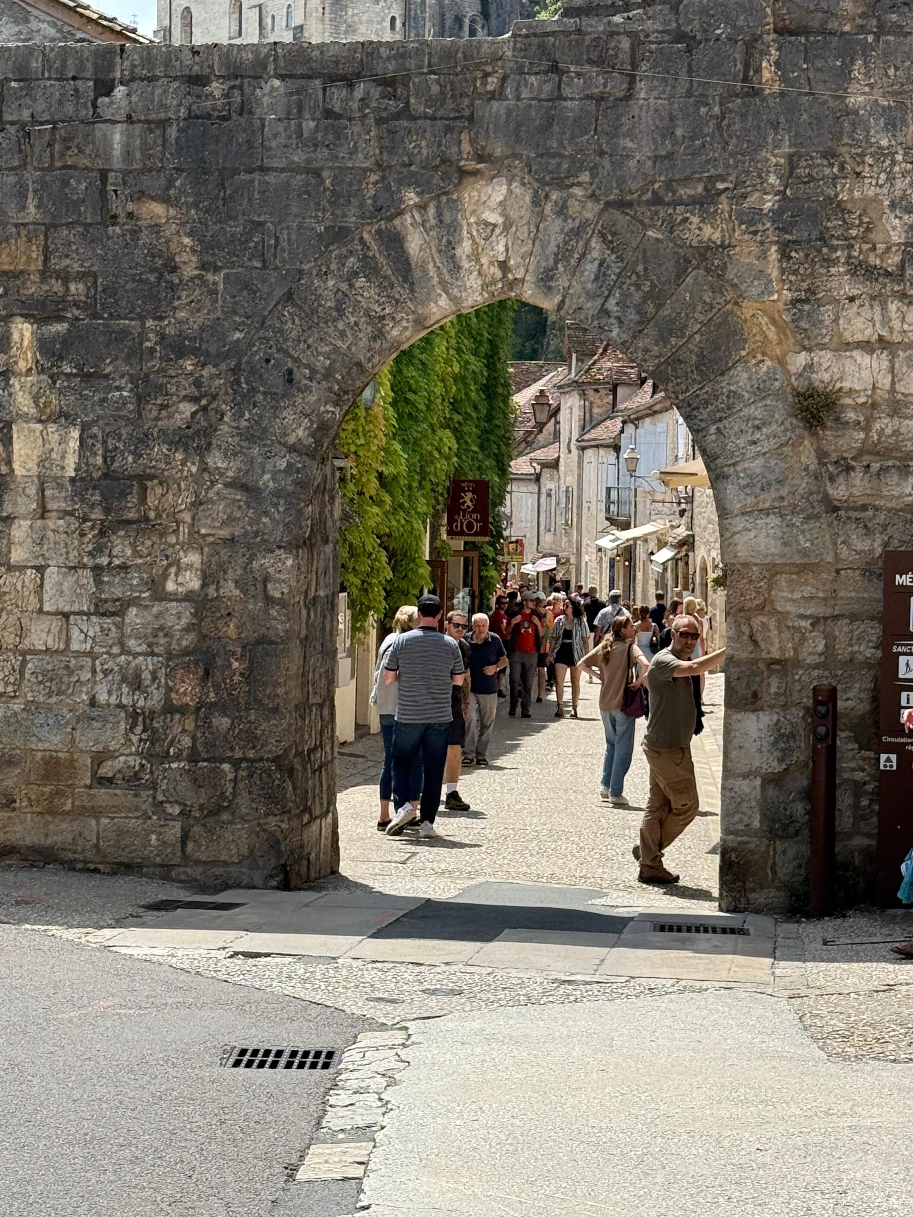 Stone arch to reach hotel. 