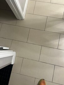 Grout missing, scraped foot on it