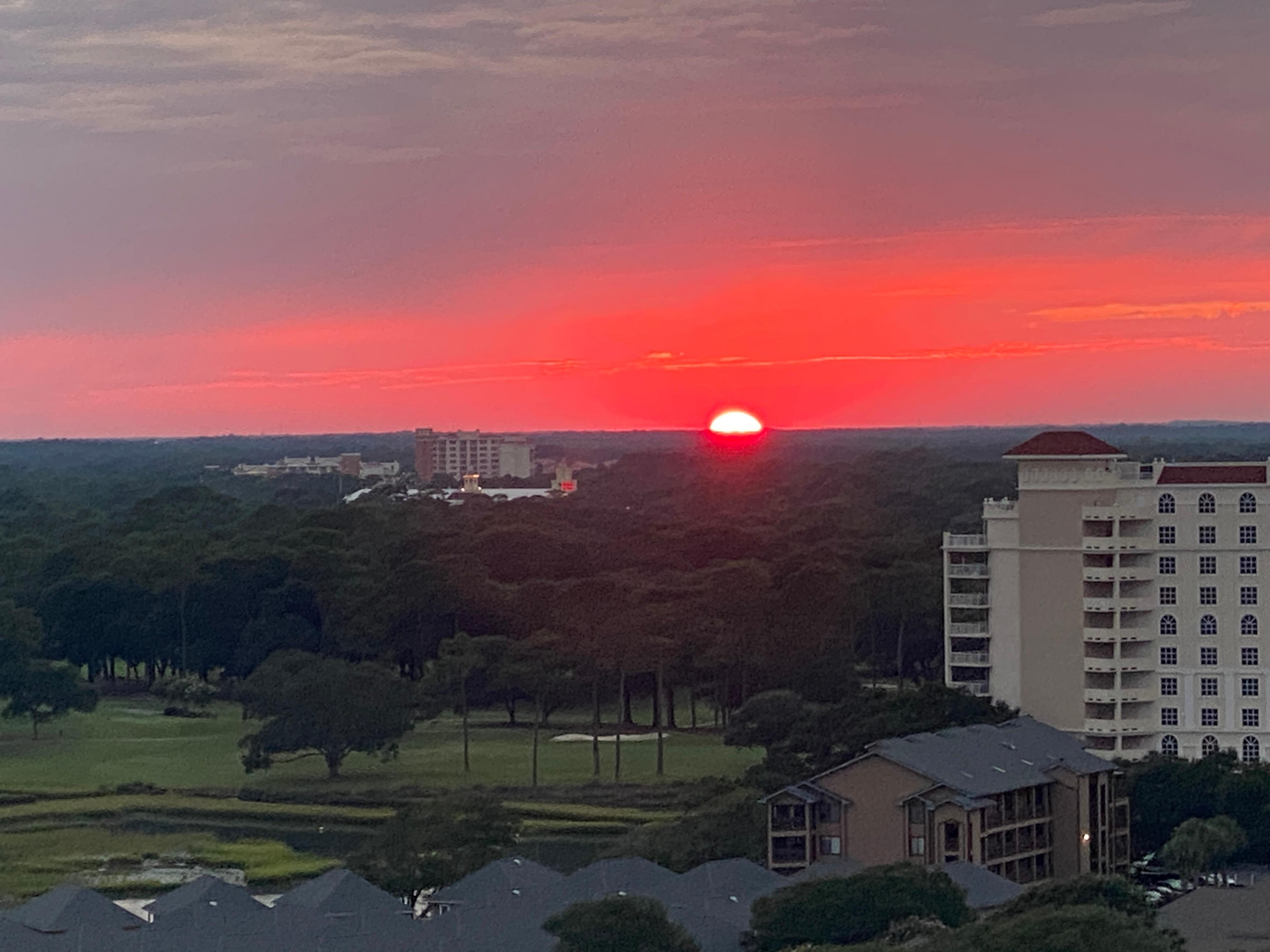 View of sunset from balcony.  