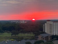View of sunset from balcony.