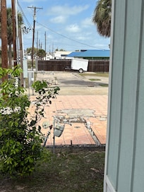 The property has broken tiles everywhere. Empty cement lots. Rundown property!