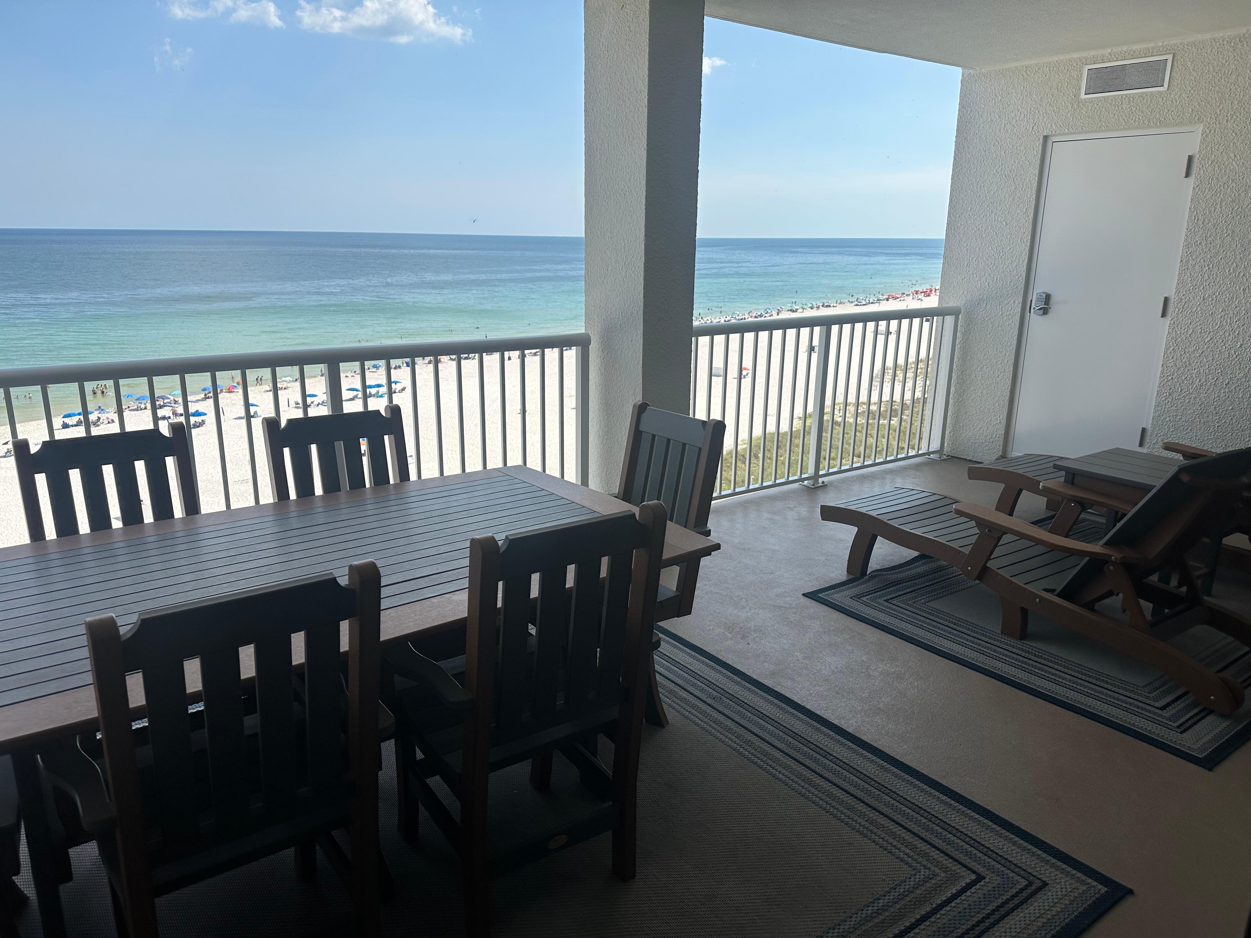 Huge balcony with plenty seating and a wonderful view