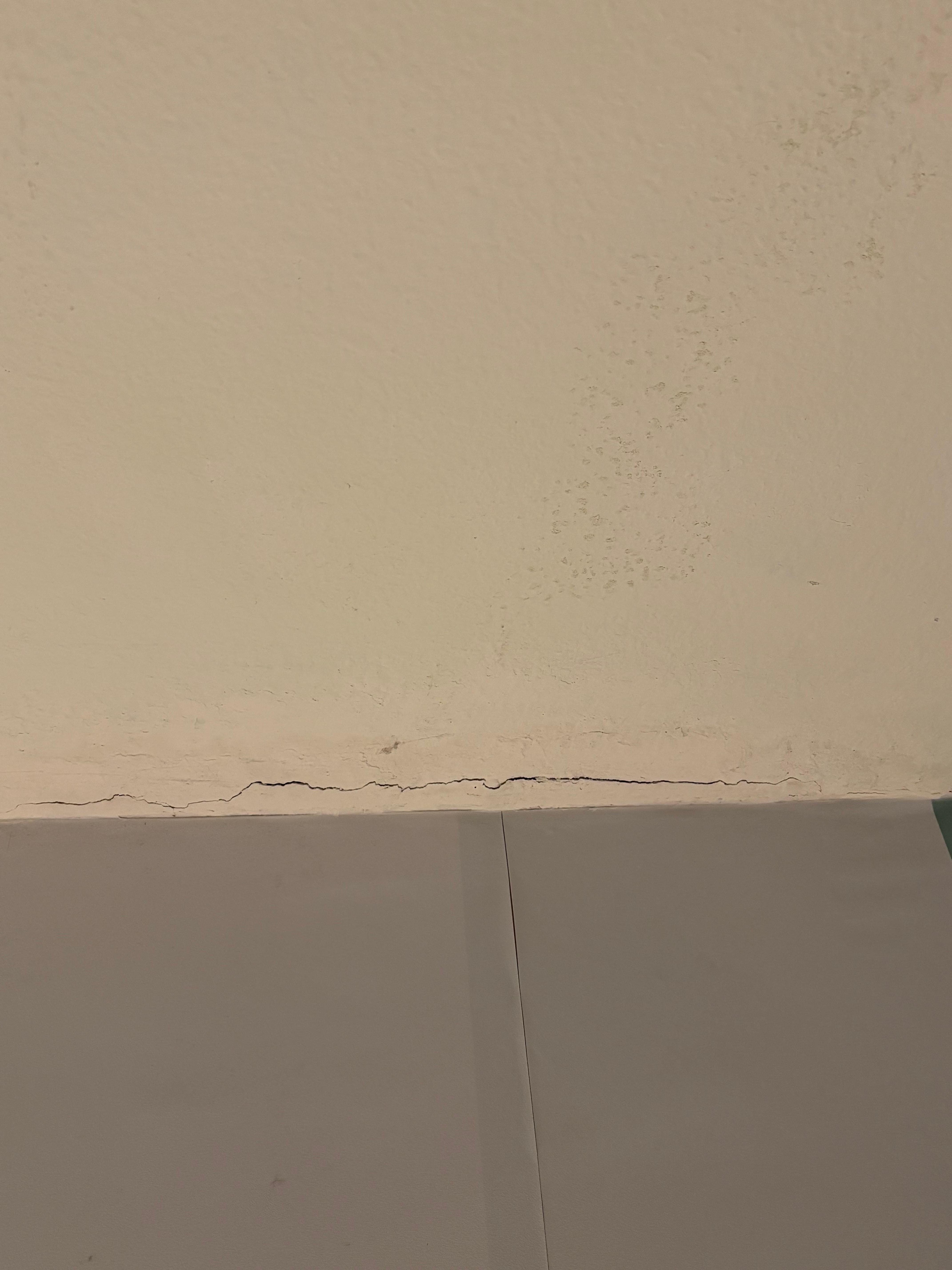 Cracks all over the room. 